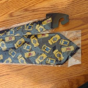 Navy and jewel tones fancy cigarette lighter print tie